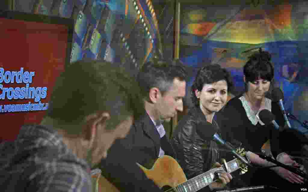 The Cranberries' lead singer, Dolores O’Riordan, smiles for the camera during the interlude to the band’s classic song “Linger”.