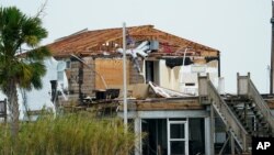 A damaged home is shown Aug. 28, 2020, in Hackberry, La., after Hurricane Laura moved through the area the day before.