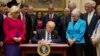 Trump Signs Bills Rolling Back Obama Regulations on Schools, Land Use and Labor
