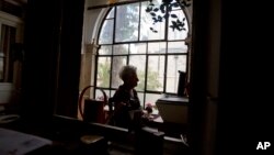 FILE - In this Jan. 20, 2016, photo, Dutch Israeli holocaust survivor Mirjam Bolle is seen in her house in Jerusalem. Throughout the Nazi occupation of Amsterdam, and while incarcerated in two prison camps, Bolle wrote letters to her fiance that she never