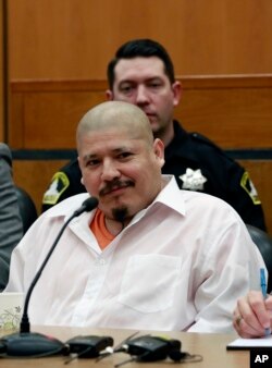 FILE - Luis Bracamontes smirks as the verdict was read in the killing of two law enforcement officers, in Sacramento Superior Court, Feb. 9, 2018, in Sacramento, Calif.