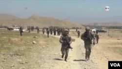Las tropas estadounidenses en Afganistán podrían iniciar pronto su regreso a casa de lograrse firmar un acuerdo entre el gobierno y el talibán. Foto VOA,