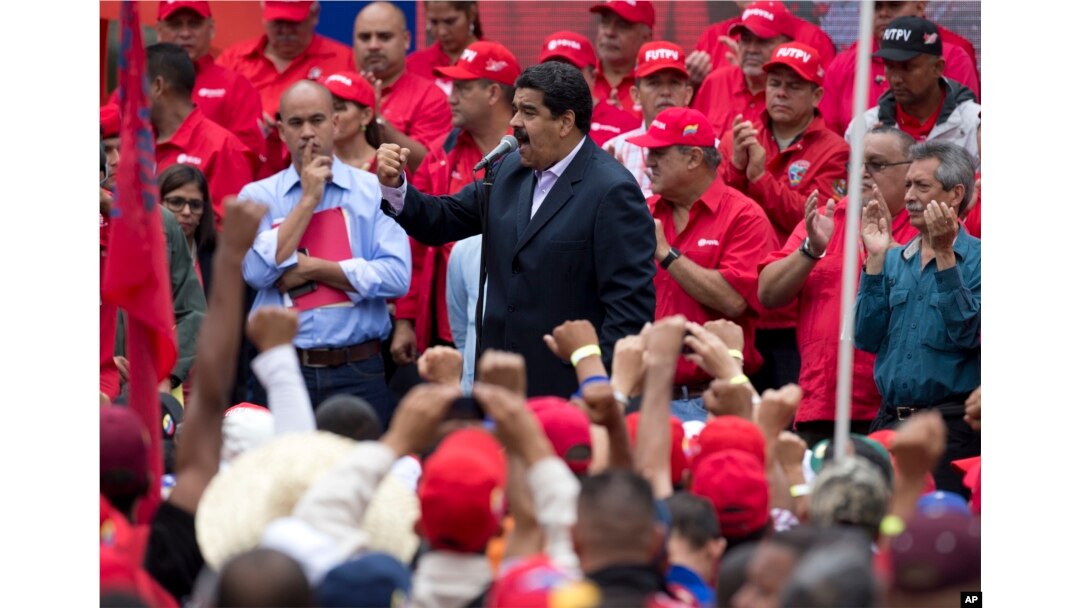 Venezuela's President Nicolas Maduro speaks to oil workers during a demonstration outside Miraflores Presidential Palace after he met with U.S. diplomat Thomas Shannon in Caracas, Venezuela, June 22, 2016.