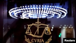 FILE - The logo of the European Court of Justice is pictured outside the main courtroom in Luxembourg, Jan. 26, 2017. 