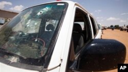 UNAMID vehicle after ambush that killed seven peacekeepers and wounded several military, police personnel, Khor Abeche, South Darfur, July 14, 2013.