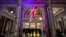 A neon flash representing David Bowie's "Aladdin Sane" stage character is seen at the entrance to the Victoria and Albert Museum to mark the "David Bowie is" exhibition in London, March 20, 2013. 