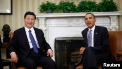 지난해 2월 백악관에서 회담을 가진 바락 오바마 미국 대통령(오른쪽)과 시진핑 중국 국가주석(왼쪽).