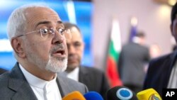 FILE - Iran's foreign minister Mohammad Javad Zarif speaks with the media after a meeting with European Union foreign policy chief Federica Mogherini at the Europa building in Brussels, May 15, 2018. 
