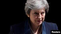 Britain's Prime Minister Theresa May leaves 10 Downing Street in London, May 23, 2018.