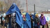 Supporters of Afghan presidential candidate Abdullah Abdullah arrive for an election gathering in Charikar. Afghanistan&#39;s April 5 election is the third presidential poll since the fall of the Taliban with 11 candidates contesting the polls.