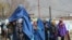 Supporters of Afghan presidential candidate Abdullah Abdullah arrive for an election gathering in Charikar. Afghanistan's April 5 election is the third presidential poll since the fall of the Taliban with 11 candidates contesting the polls.