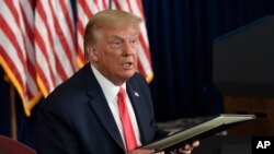 President Donald Trump speaks at a news conference at the Trump National Golf Club in Bedminster, N.J., Aug. 8, 2020.