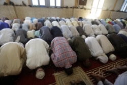 Muslims perform Friday prayers during the holy fasting month of Ramadan, at a Grand mosque in N'Djamena, Chad, April 30, 2021.