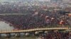 Pilgrims gather to take a holy dip at Sangam, the confluence of the Ganges, Yamuna and mythical Saraswati rivers, on the occasion of 'Mauni Amavasya' during the Maha Kumbh Mela festival in Prayagraj on Jan. 29, 2025.