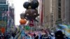 The Ada Twist balloon moves down Sixth Avenue during the Macy's Thanksgiving Day Parade in New York, Thursday, Nov. 25, 2021