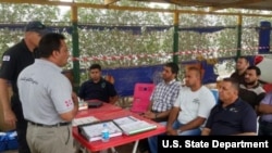 FILE - With U.S. support, personnel from Norwegian People’s Aid provides training to Iraqi demining officials [NPA].