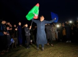 Afghan youth dance and peace activists gather as they celebrate the reduction in violence, in Jalalabad, Afghanistan, Feb. 27, 2020. In street interviews by VOA teams, Afghans have said peace is their top priority.