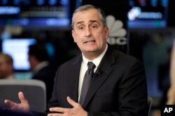 FILE - Intel CEO Brian Krzanich is interviewed on the floor of the New York Stock Exchange, March 13, 2017. Krzanich resigned from the American Manufacturing Council to call attention to America's "divided political climate."