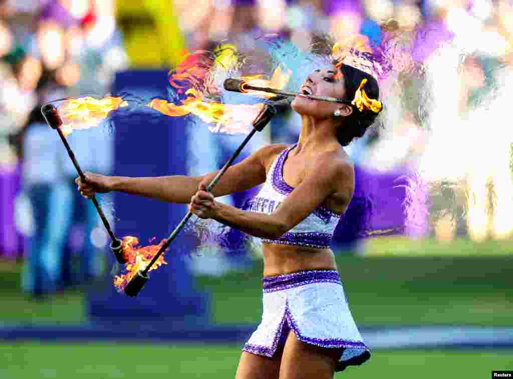 TCU Horned Frogs twirler performs during halftime of the NCAA football game against the Baylor Bears at Amon G. Carter Stadium. (Credit: Kevin Jairaj-USA TODAY Sports)