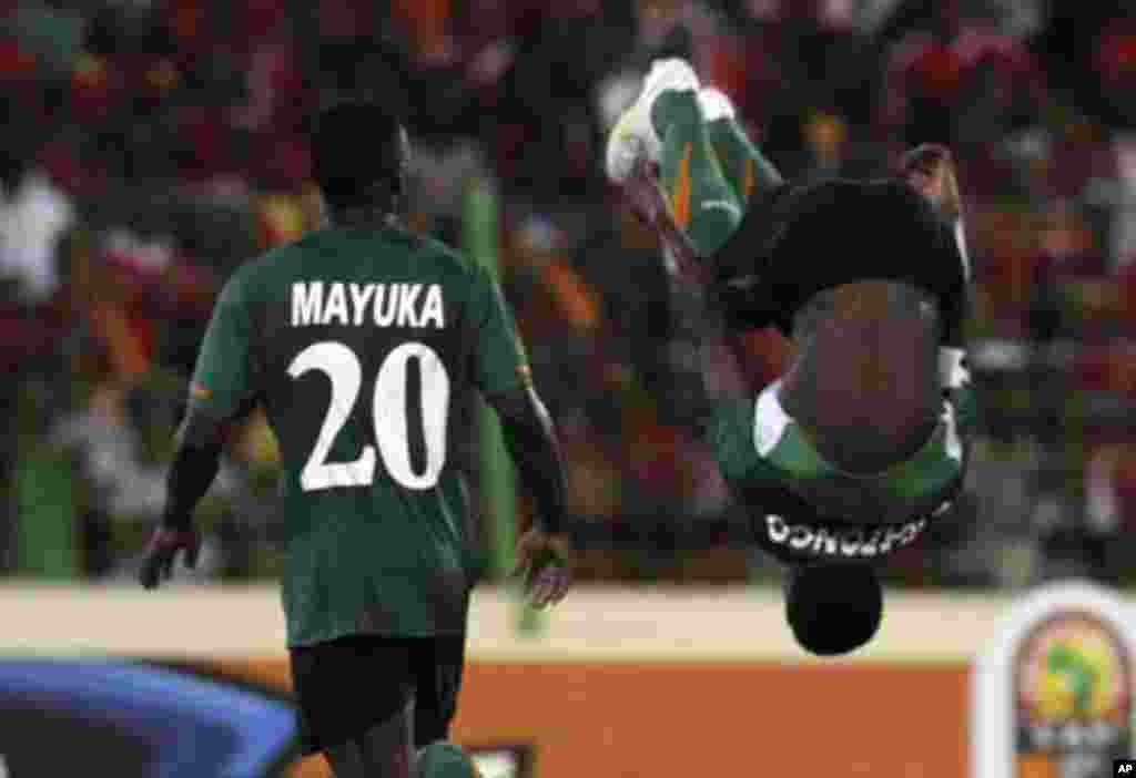 Christopher Katongo (R) of Zambia celebrates with teammate Emmanuel Mayuka after scoring against Equatorial Guinea during their African Nations Cup soccer match in Malabo January 29, 2012.