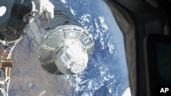 Astronauts Complete Spacewalk Early After Ammonia Leak