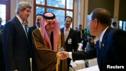 U.S. Secretary of State John Kerry (L) stands beside as Saudi Arabia's Foreign Minister Prince Saud al-Faisal (2nd L) is welcomed by U.N. Secretary-General Ban Ki-moon (R) prior to the Geneva-2 peace talks in Montreux January 22, 2014. Syria's government 
