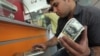 نوسان دلار و « سهمیه بندی ارز » در ایران 