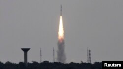 India's Polar Satellite Launch Vehicle, carrying five satellites, lifts off from the Satish Dhawan Space Centre in Sriharikota, north of the southern Indian city of Chennai, June 30, 2014.