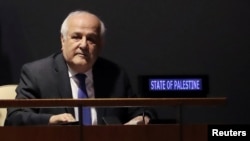 Palestinian Ambassador to the United Nations Riyad Mansour sits while members of the U.N. General Assembly vote on whether to allow the Palestinians to procedurally act like a member state during meetings in 2019, when they will chair the group of 77 developing nations, at the United Nations in New York, Oct. 16, 2018.