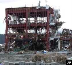 The roof of this building in Minamisanriku, Japan was a designated safe haven, but it proved insufficiently high. Around 10 people managed to cling to life there, but 20 others were swept away.