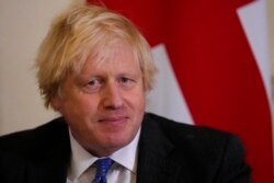 Britain's Prime Minister Boris Johnson is seen at 10 Downing Street in London, Dec. 16, 2021.