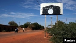 A sign for the radical Islamist group MUJAO is seen in Douentza, Mali, January 29, 2013.