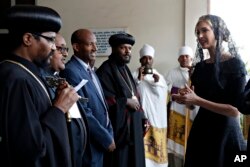 White House senior adviser Ivanka Trump, right, arrives for a ceremony at Holy Trinity Cathedral honoring the victims of the Ethiopian Airlines crash, Monday April 15, 2019, in Addis Ababa, Ethiopia.