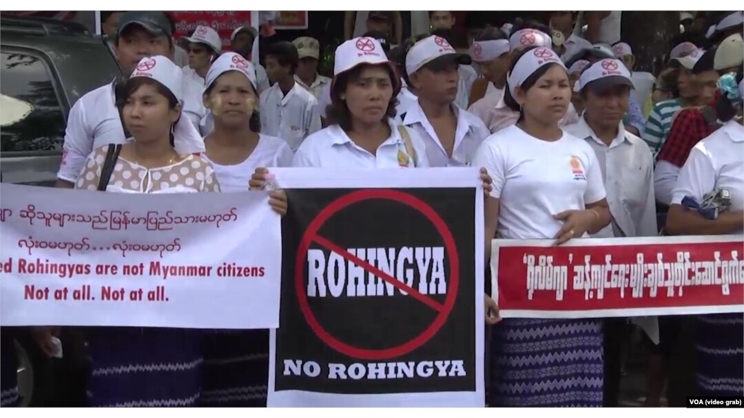 Demonstrators hold banners outside the U.S. Embassy in Yangon, Myanmar, April 28, 2016, to protest against the embassy's use of the word "Rohingya."
