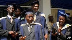 Students of the University of Ibadan check their graduation gowns at their campus in Ibadan, south west Nigeria (2006 file photo).