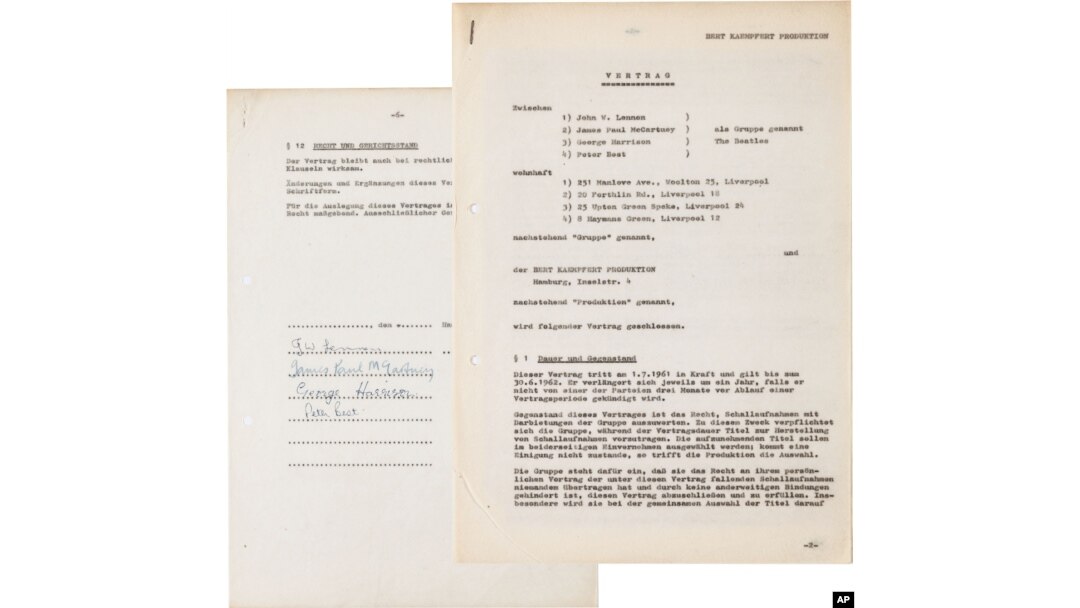 This undated photo provided by Heritage Auctions from an upcoming Beatles collection sale shows the Beatles’ first recording contract, which was signed in Hamburg, Germany, where the band honed its craft performing in the city’s nightclub district.