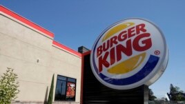 FILE - This April 25, 2019, file photo shows a Burger King in Redwood City, Calif. Burger King is announcing its work to help address a core industry challenge: the environmental impact of beef. To help tackle this environmental issue, the Burger King br