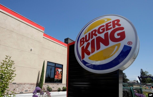 FILE - This April 25, 2019, file photo shows a Burger King in Redwood City, Calif. Burger King is announcing its work to help address a core industry challenge: the environmental impact of beef. To help tackle this environmental issue, the Burger King br