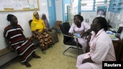 Midwives conduct consultations for pregnant women at the Treichville General Hospital during International Day of the Midwife in Abidjan, May 5, 2015. 