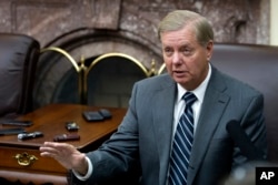 FILE - Sen. Lindsey Graham, R-S.C., speaks with reporters in the Senate Press Gallery on Capitol Hill, in Washington, Nov. 15, 2016.