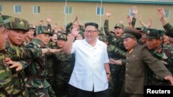 North Korea leader Kim Jong Un inspects Unit 1524 of the Korean People's Army in this undated photo released by North Korea's Korean Central News Agency, June 30, 2018.