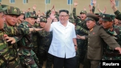 North Korea leader Kim Jong Un inspects Unit 1524 of the Korean People's Army in this undated photo released by North Korea's Korean Central News Agency, June 30, 2018.