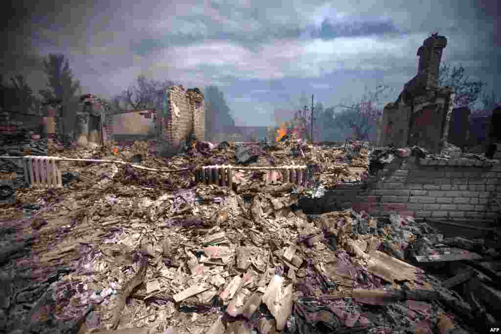 A view of a house destroyed in an air strike carried out by Ukrainian armed forces in the village of Stanitsa Luganskaya.