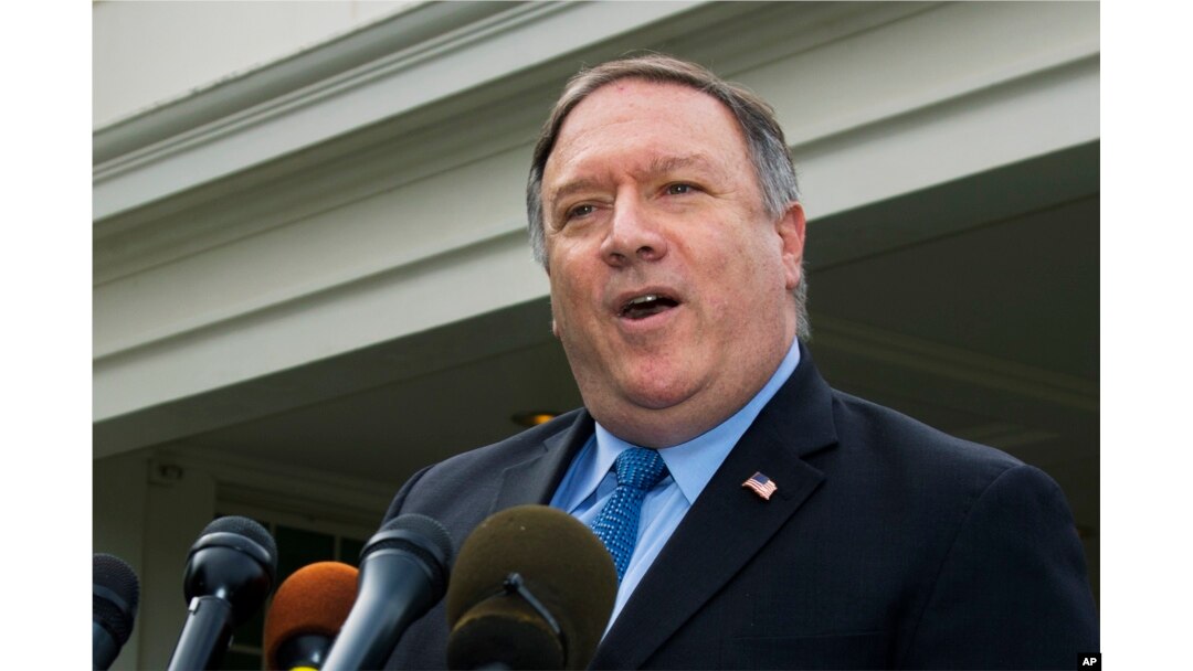 FILE - U.S. Secretary of State Mike Pompeo speaks to reporters outside the White House in Washington, Oct. 9, 2018.