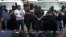 Nicaragua National Police present 18 foreigners believed to be Mexican nationals who posed as Televisa journalists, in Managua, Nicaragua, August 24, 2012. 