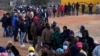 Voters line up to cast their ballot for general elections in Alexandra, near Johannesburg, South Africa, Wednesday, May 29, 2024. 