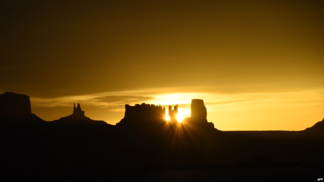 The sun rises over the Monument Valley on April 19, 2018. The region is part of the Colorado Plateau and lies within the territory of the Navajo Nation Reservation.