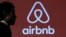 FILE - An Airbnb logo in Tokyo, Japan, Nov, 26, 2015. 