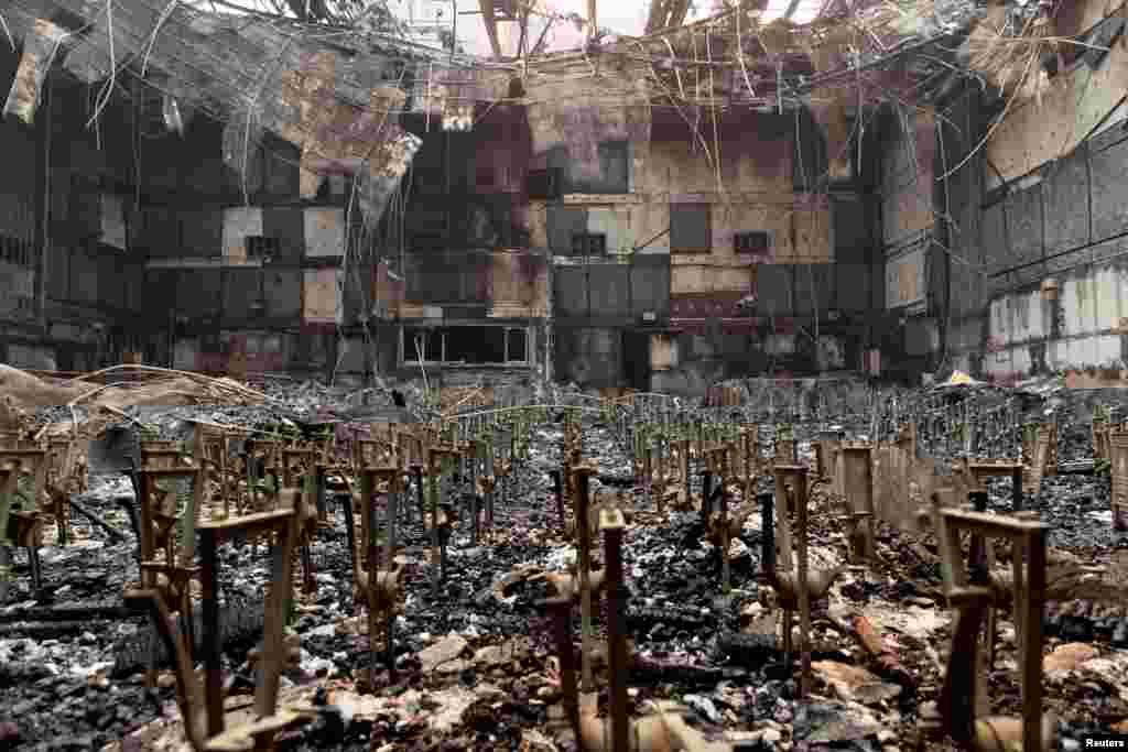 The auditorium of Eliot Arts Magnet Middle School lies in ruins after wildfires swept through Altadena, California, Jan. 9, 2025. 