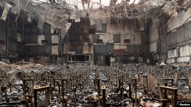 The auditorium of Eliot Arts Magnet Middle School lies in ruins after wildfires swept through Altadena, California, Jan. 9, 2025.